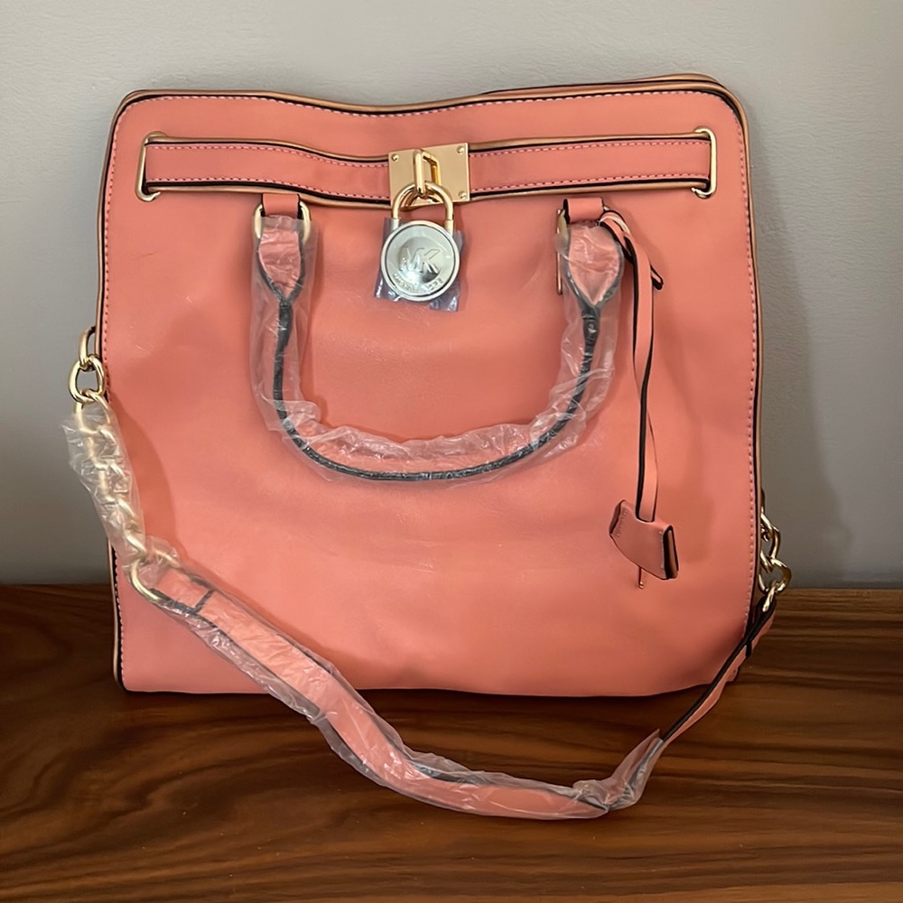 NEVER USED Michael Kors light pink/coral handbag - lots of room